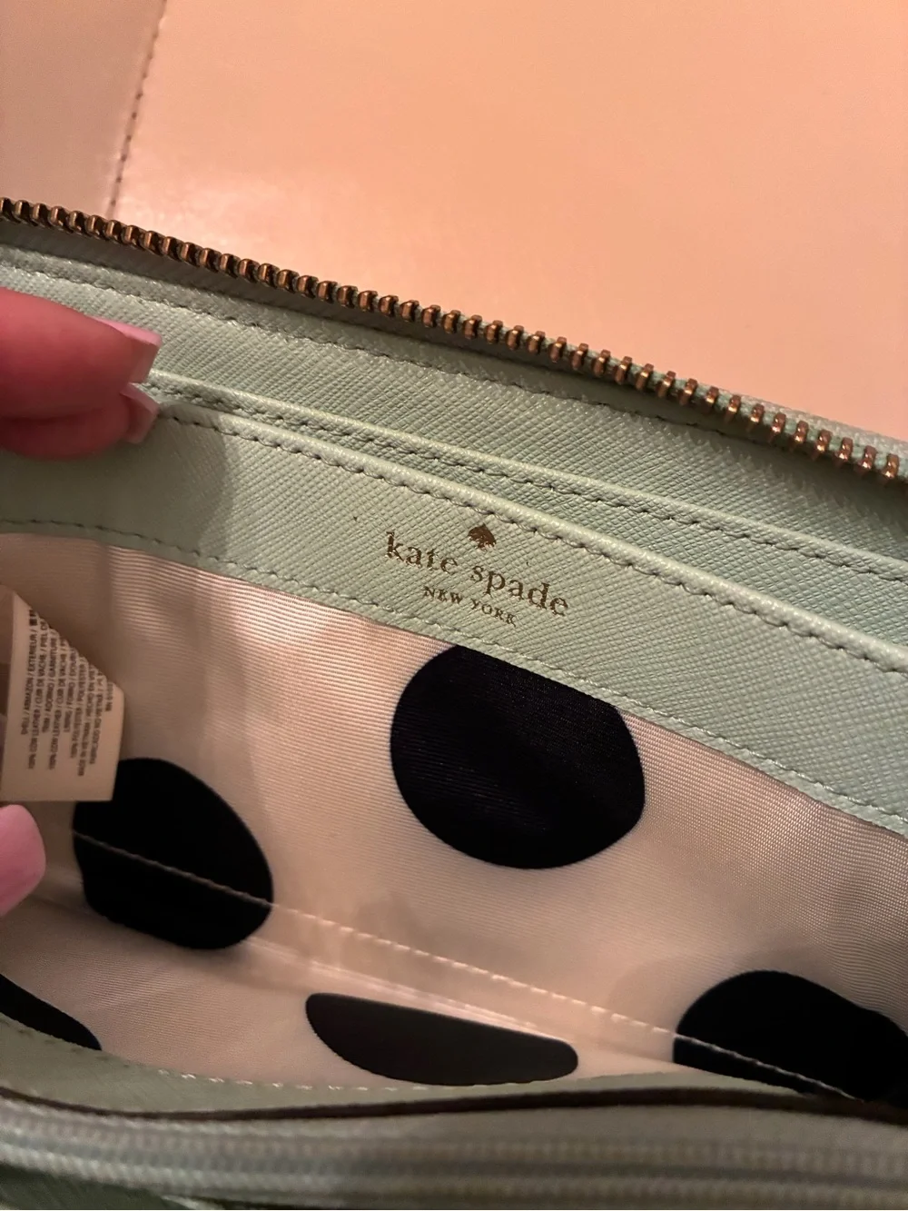 kate spade mint green zip-around leather wallet with gold logo